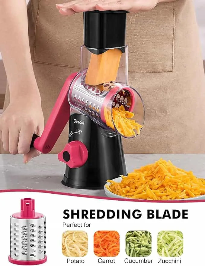 Black and rosy Geedel rotary cheese grater using the coarse shredding blade for shredded cheese and vegetables.