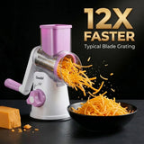A product shot of the Geedel suction-base rotary grater, demonstrating high-speed shredding of cheddar cheese.