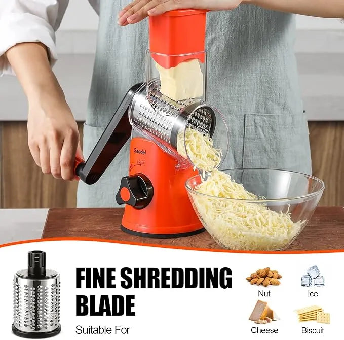 Orange and black Geedel rotary cheese grater using the fine shredding blade for parmesan, pasta, and garnish.