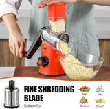 Orange and black Geedel rotary cheese grater using the fine shredding blade for parmesan, pasta, and garnish.