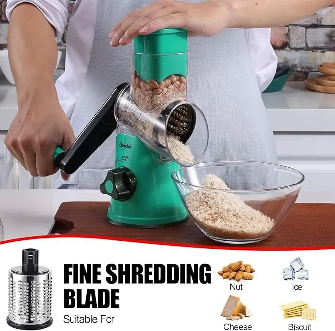 Teal and black Geedel rotary cheese grater using the fine shredding blade for parmesan, pasta, and fresh toppings.