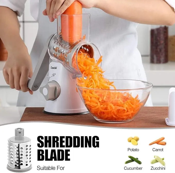 White and grey Geedel rotary cheese grater using the coarse shredding blade for cheese, carrots, and everyday prep.